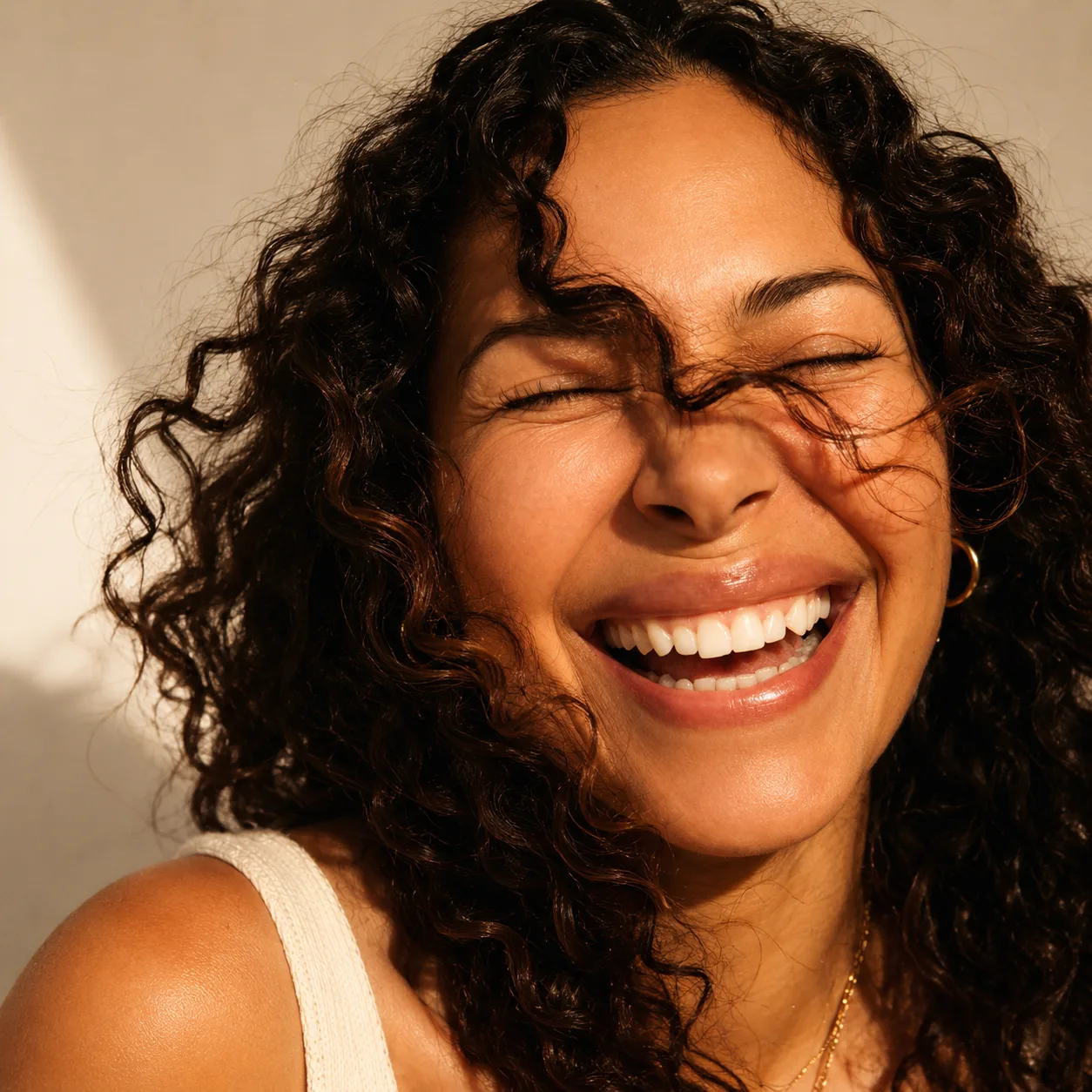 Woman with radiant skin in warm natural light
